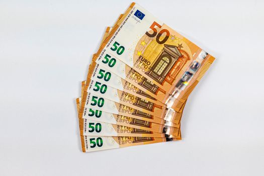 50 euro banknotes fan out on white background