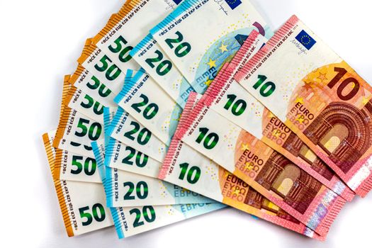 50 20 10 euro banknotes fan out on white background