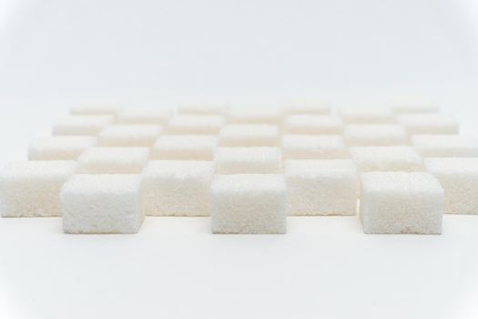 sugar cubes staggered Glucose refined food ingredient. High quality photo