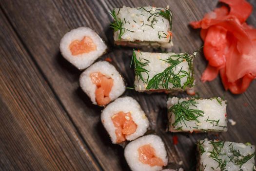stuffed sushi rolls seafood wasabi ginger asian food. High quality photo