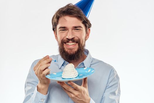 Happy guy with birthday cake white background Compact corporate party cropped beard view. High quality photo