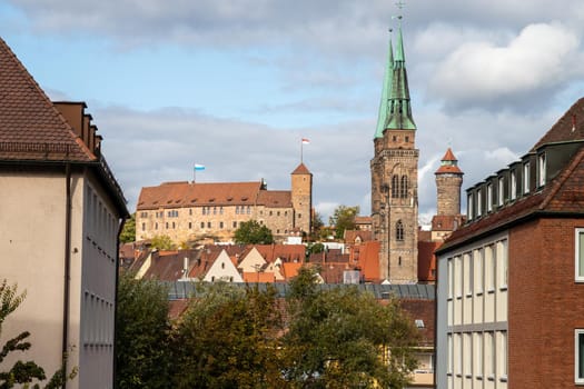 View at the St. Sebaldus church and the castle in  Nuremberg, Bavaria, Germany  in autunm