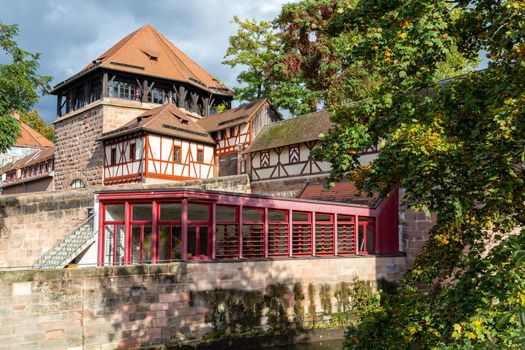 Pegnitz river in Nuremberg,  Bavaria, Germany  in autunm with multicolored trees