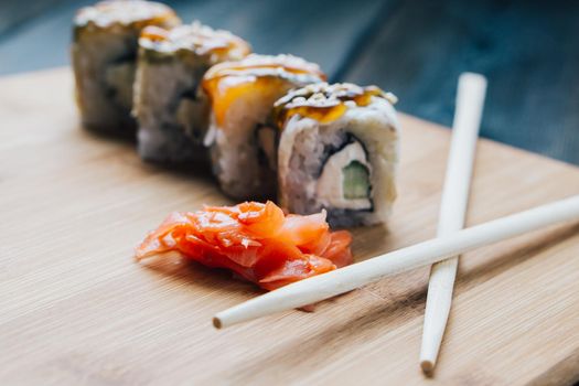 ginger sushi chopsticks wood board sauce menu restaurant. High quality photo