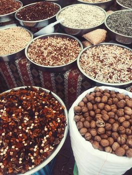 Nuts and seeds in bags in the traditional market. High quality photo