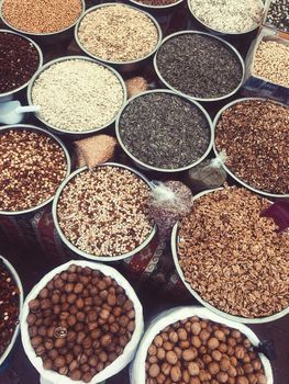 Nuts and seeds in bags in the traditional market. High quality photo