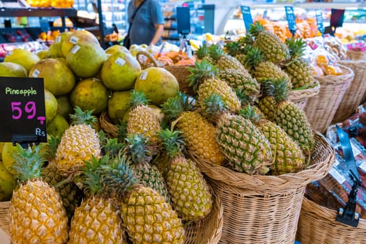 Pineapple counters in the grocery section of the supermarket.