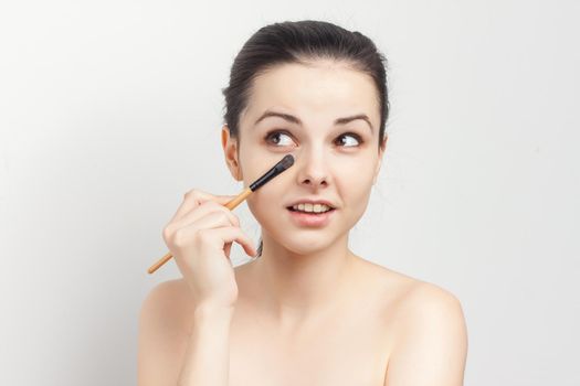 woman naked shoulders face cream skin care cropped view. High quality photo