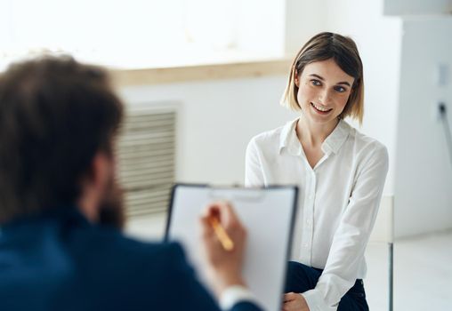 Male psychologist next to the patient diagnosis consultation treatment. High quality photo