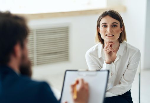 woman in consultation with a psychotherapist message health diagnosis. High quality photo