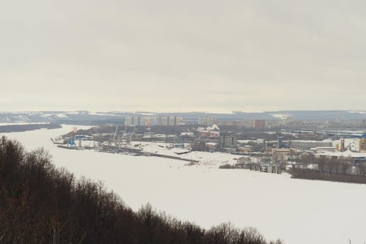 Frozen river, Industrial pride by the river, production, factories and nature. High quality photo