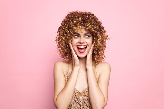 Female Look towards Delight curly hair portrait curly hair pink background