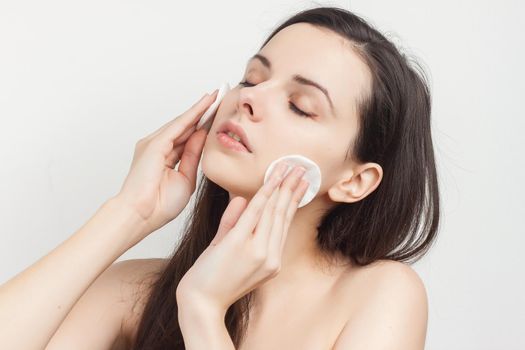 funny pomegranate with bare shoulders loose hair clean face sponges. High quality photo