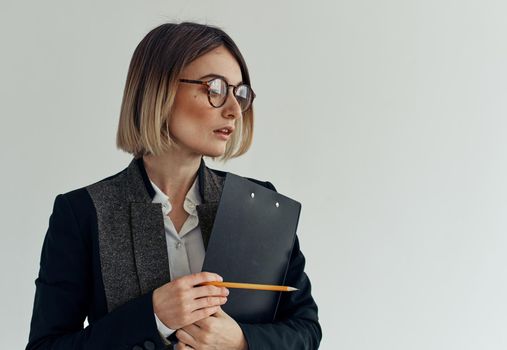 Business woman in classic suit documents model director of the firm. High quality photo