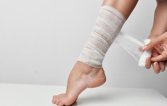trauma bandaged feet health problems medicine treatment. High quality photo