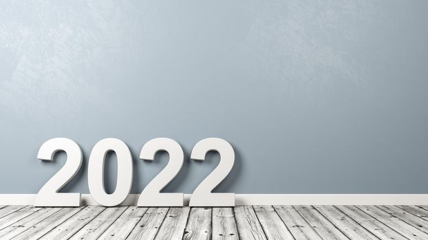 White 2022 Number Text Shape on Wooden Floor Against Grey Wall with Copyspace 3D Illustration