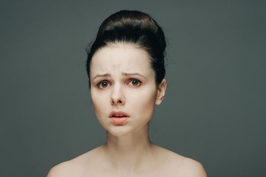 woman with bare shoulders clean skin care close-up. High quality photo