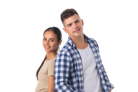 Smiling young couple standing together isolated on white background