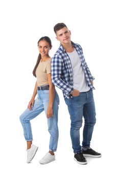 Smiling young couple standing together full length portrait isolated on white background