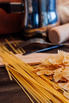 Italian pasta kitchen cooking wood table ingredients. High quality photo