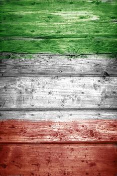 Italy Flag on wood background. It can be used as concepts and backgrounds.