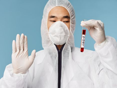 Male laboratory assistant medical clothing blood test covid-19 examination safety. High quality photo