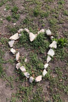 Heart shape from stones on the ground