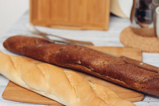 fresh baked goods on various table legs kitchen breakfast . High quality photo