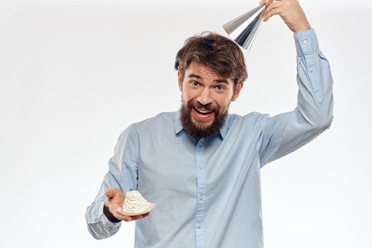 Happy guy with birthday cake white background Compact corporate party cropped beard view. High quality photo