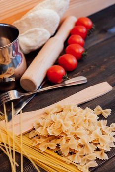 italian pasta cooking or cherry tomatoes cuisine lunch diet food. High quality photo