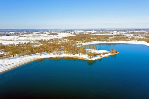 Aerial from lake Bussloo in the Netherlands in winter