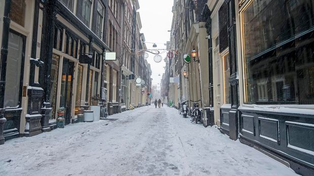 Snowy red light district in Amsterdam the Netherlands
