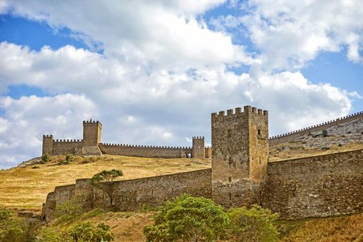 Landscape overlooking the Genoese fortress against the sky. Sudak, Crimea