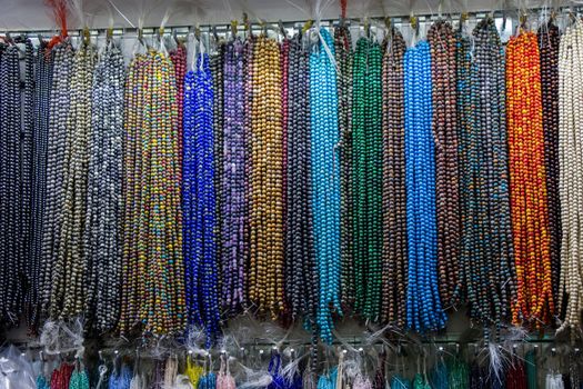 Colorful beads of various color at a market