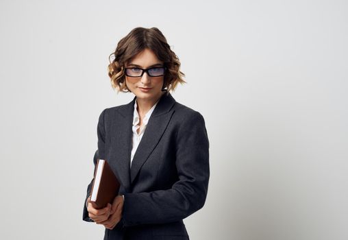 Woman in glasses business finance documents and black jacket shirt. High quality photo