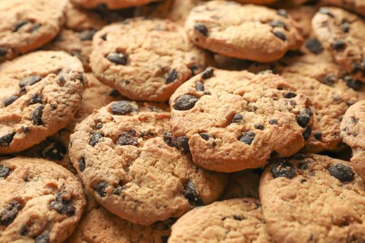 Tasty chocolate chip cookies as background