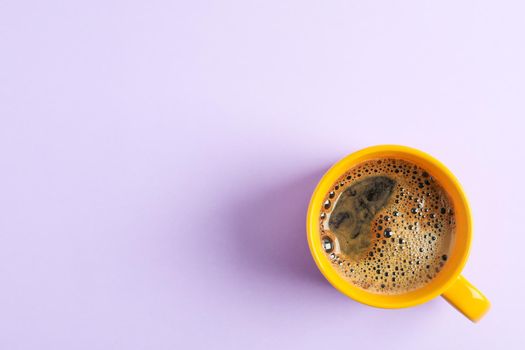 Cup of coffee on color background, space for text