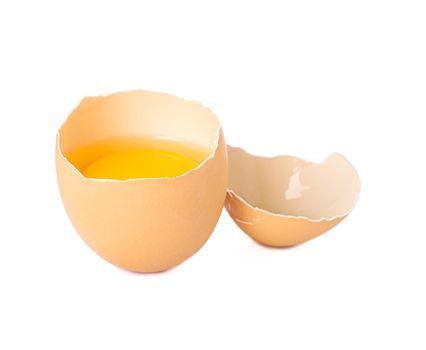 Half broken egg with yolk isolated on white background