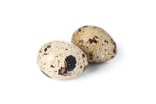 Raw quail eggs isolated on white background