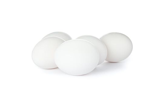 White chicken eggs isolated on white background