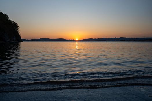 Seascape with beach and sunset views. Beauty of nature.