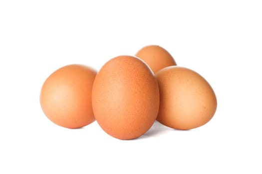 Few raw chicken eggs on white background