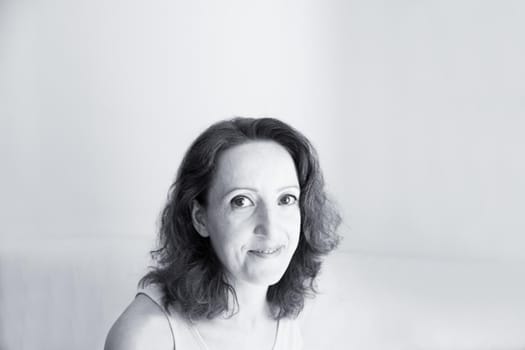 Portrait of woman with happy and positive expression. Copy space.