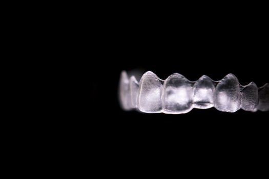 Transparent ferule retainer teeth alignment. Copy space