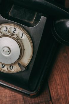 retro telephone old technology communication antique wood background. High quality photo