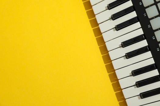 Midi keyboard on color background, space for text