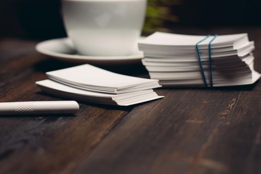 coffee cup on the table business cards office desktop. High quality photo