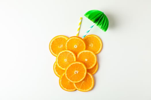 Composition with orange pieces and tubules on white background, top view and space for text. Citrus fruits