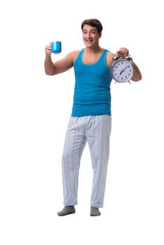 Man waking up with alarm clock isolated on white