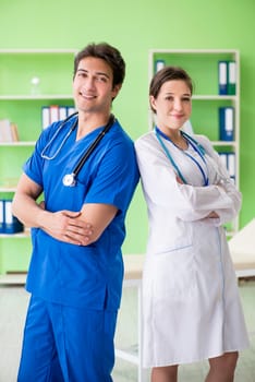 Woman and man doctors radiologists working at the clinic 